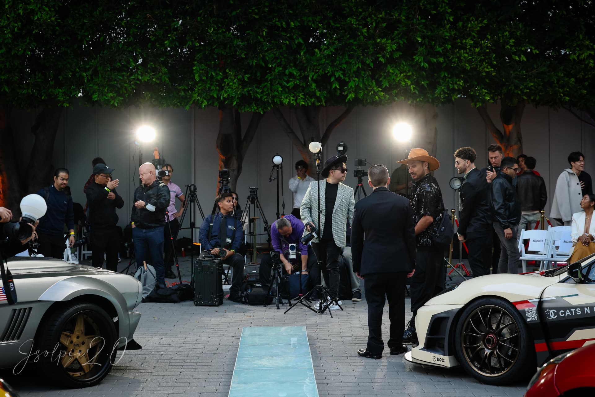 Cars & Capital paddock and press line at 3370 Livonia